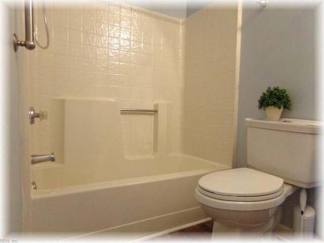 1563 N King St Unit 110, Hampton, VA 23669 - bathroom featuring toilet and  shower combination
