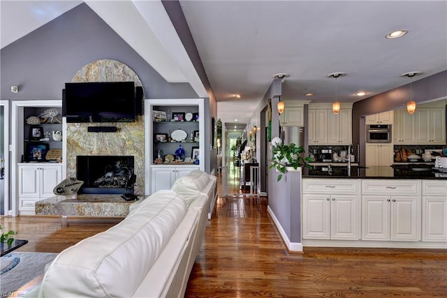 103 Acacia Ct, Williamsburg, VA 23185 - living room with dark wood-style flooring, a premium fireplace, recessed lighting, and built in features