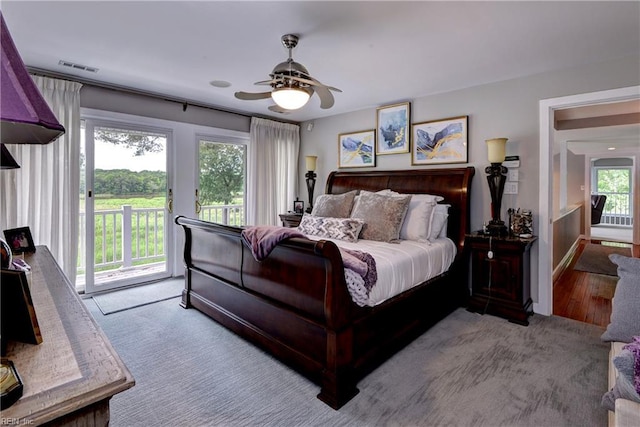 103 Acacia Ct, Williamsburg, VA 23185 - bedroom with access to outside, carpet, and a ceiling fan