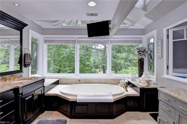 103 Acacia Ct, Williamsburg, VA 23185 - full bath featuring lofted ceiling, plenty of natural light, a garden tub, and recessed lighting