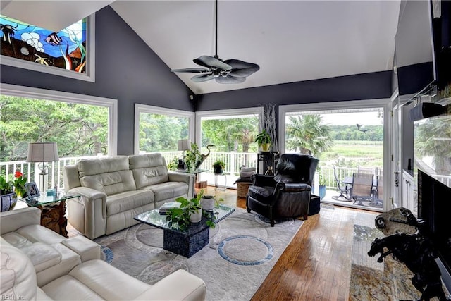 103 Acacia Ct, Williamsburg, VA 23185 - living room featuring wood-type flooring, a ceiling fan, healthy amount of natural light, and high vaulted ceiling