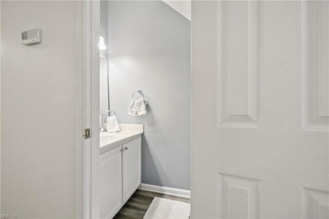 610 Barberton Dr, Virginia Beach, VA 23451 - bathroom featuring vanity, baseboards, and wood finished floors