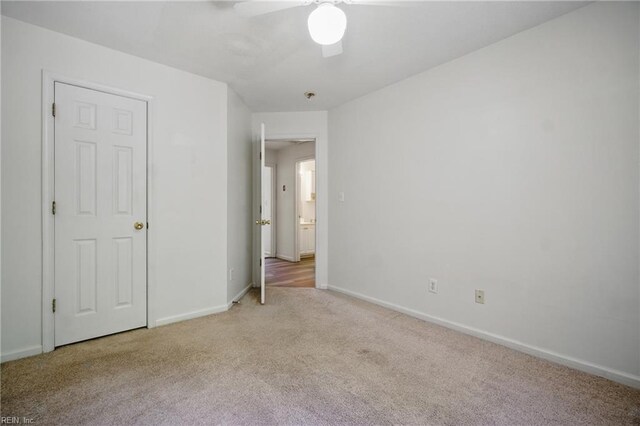 610 Barberton Dr, Virginia Beach, VA 23451 - unfurnished bedroom featuring light carpet, baseboards, and ceiling fan