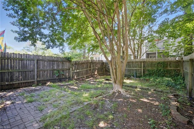 610 Barberton Dr, Virginia Beach, VA 23451 - fenced backyard with a patio area