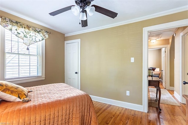 200 Ferguson Ave, Newport News, VA 23601 - bedroom featuring light wood-style floors, attic access, baseboards, ornamental molding, and ceiling fan