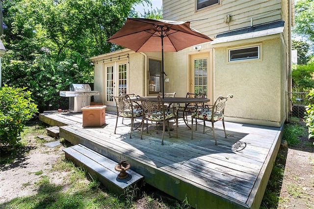 200 Ferguson Ave, Newport News, VA 23601 - wooden terrace with french doors, grilling area, and outdoor dining space