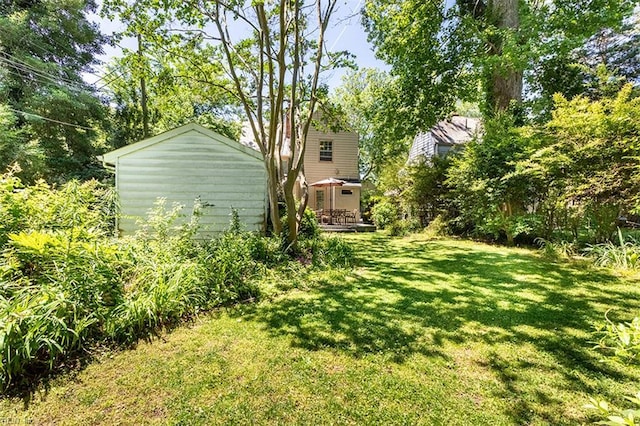 200 Ferguson Ave, Newport News, VA 23601 - view of grassy yard with a deck and an outdoor structure
