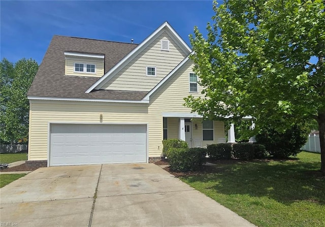 view of front of house featuring driveway, a shingled roof, and covered porch
