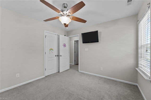 3001 Ravine Gap Dr, Suffolk, VA 23434 - unfurnished bedroom with carpet flooring, baseboards, and a ceiling fan