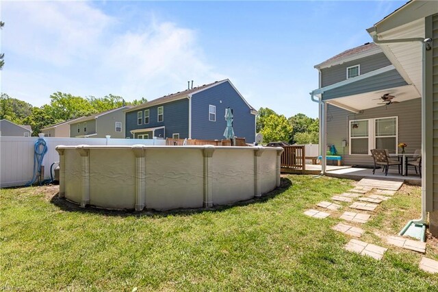 3001 Ravine Gap Dr, Suffolk, VA 23434 - view of yard featuring ceiling fan and a patio area