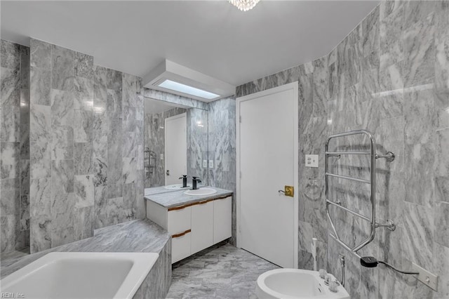 3556 Shore Dr Unit 704, Virginia Beach, VA 23455 - full bath with a bidet, a tub with marble appearance, marble tiled floors, vanity, and tile walls
