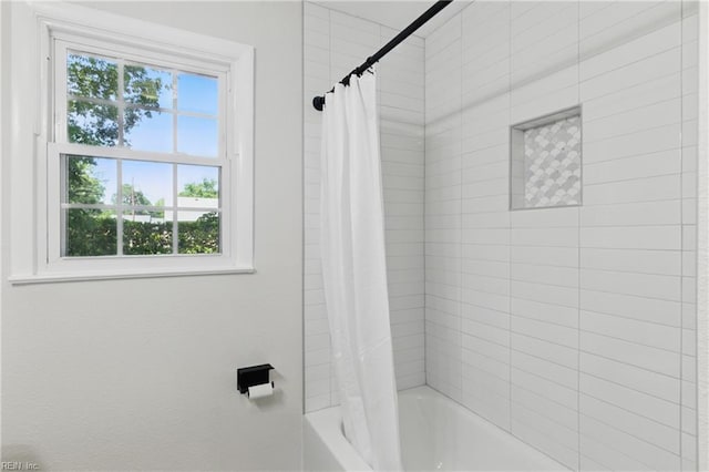 4009 Forresthills Dr, Portsmouth, VA 23703 - bathroom with plenty of natural light and shower / bathtub combination with curtain
