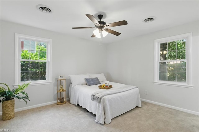 4009 Forresthills Dr, Portsmouth, VA 23703 - bedroom with light colored carpet, baseboards, and a ceiling fan