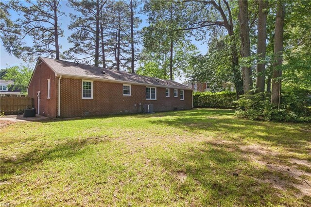 4009 Forresthills Dr, Portsmouth, VA 23703 - rear view of property with crawl space, brick siding, and cooling unit