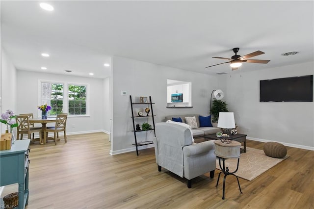4009 Forresthills Dr, Portsmouth, VA 23703 - living room featuring light wood-style flooring, a ceiling fan, recessed lighting, and baseboards