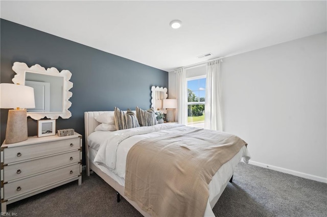 3019 Dalton Cir, Suffolk, VA 23435 - bedroom with dark colored carpet and baseboards
