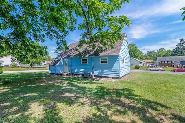 103 E Weaver Rd, Hampton, VA 23666 - view of home's exterior featuring a yard and roof with shingles