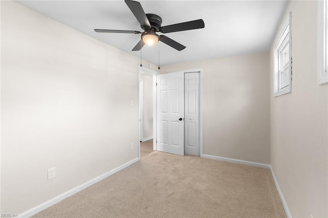 103 E Weaver Rd, Hampton, VA 23666 - unfurnished bedroom with light colored carpet, baseboards, a closet, and a ceiling fan
