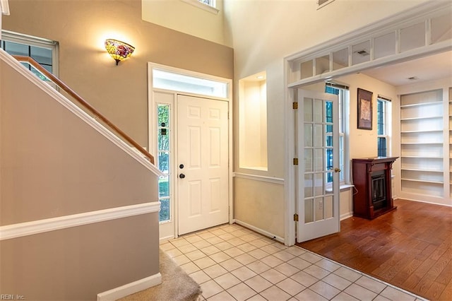 1209 Willow Creek Ct, Chesapeake, VA 23321 - entryway with light tile patterned floors, baseboards, and stairway