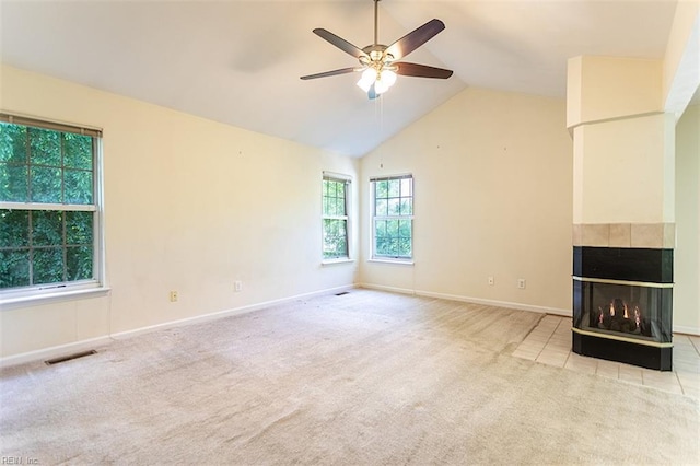1209 Willow Creek Ct, Chesapeake, VA 23321 - unfurnished living room featuring a multi sided fireplace, carpet floors, ceiling fan, vaulted ceiling, and baseboards