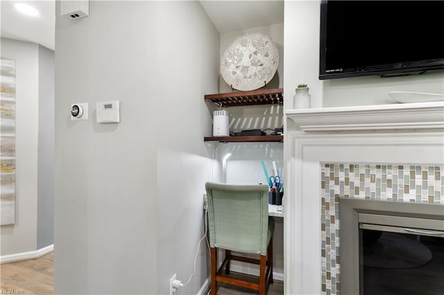 164 Nottingham Trl, Newport News, VA 23602 - detailed view of baseboards, wood finished floors, and a tile fireplace