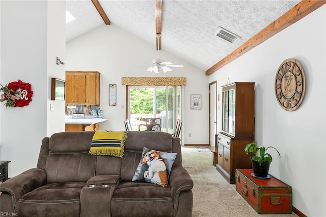3408 Waterview Rd, Toano, VA 23168 - living area with beam ceiling, ceiling fan, high vaulted ceiling, light carpet, and a textured ceiling