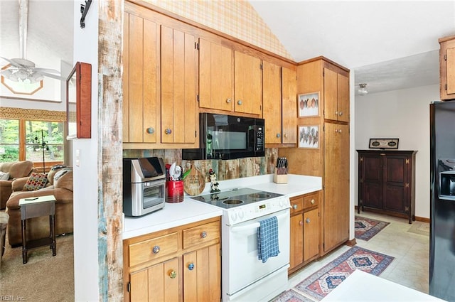 3408 Waterview Rd, Toano, VA 23168 - kitchen featuring black appliances, lofted ceiling, a ceiling fan, light countertops, and tasteful backsplash