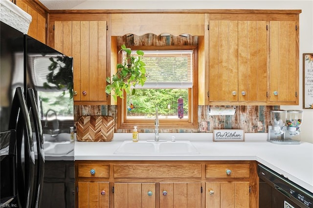 3408 Waterview Rd, Toano, VA 23168 - kitchen with black appliances, light countertops, a sink, and brown cabinetry
