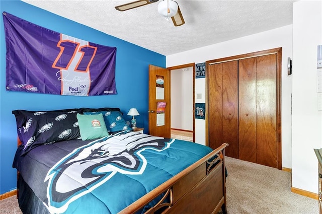 3408 Waterview Rd, Toano, VA 23168 - carpeted bedroom featuring baseboards, a textured ceiling, a closet, and ceiling fan