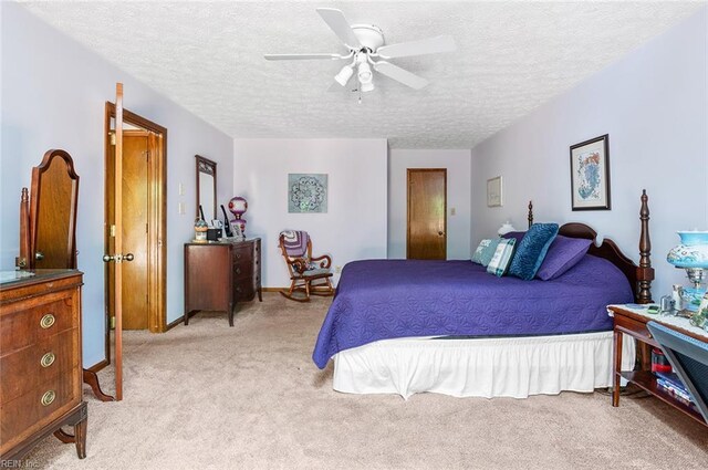 3408 Waterview Rd, Toano, VA 23168 - bedroom with light colored carpet, a textured ceiling, a ceiling fan, and baseboards