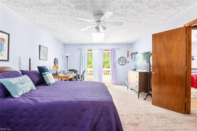 3408 Waterview Rd, Toano, VA 23168 - carpeted bedroom featuring access to outside, a textured ceiling, a desk, and a ceiling fan