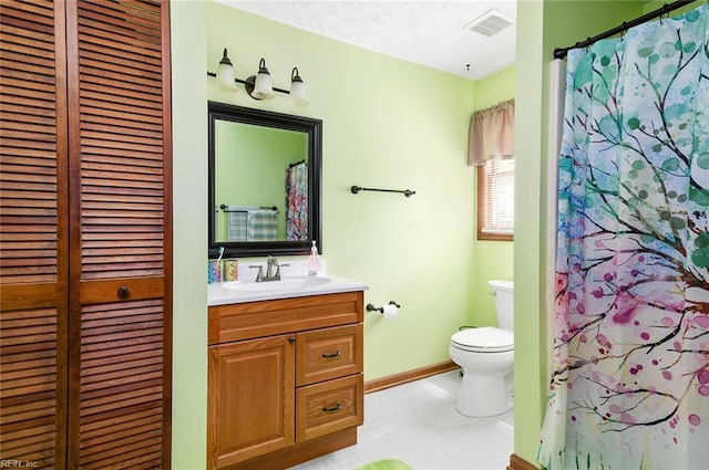 3408 Waterview Rd, Toano, VA 23168 - full bathroom with toilet, vanity, a closet, and baseboards