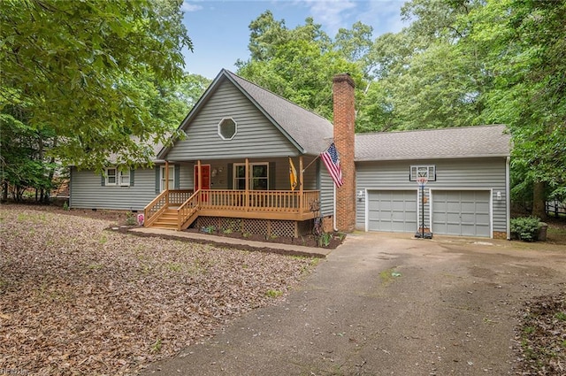 3408 Waterview Rd, Toano, VA 23168 - view of front of property with a porch, a chimney, driveway, crawl space, and a garage