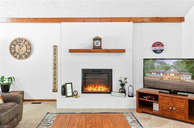 3408 Waterview Rd, Toano, VA 23168 - carpeted living area with beam ceiling, a fireplace, and baseboards