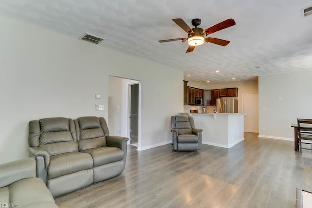2825 Ridgeboard Pl, Chesapeake, VA 23323 - living area featuring ceiling fan, wood finished floors, baseboards, and recessed lighting