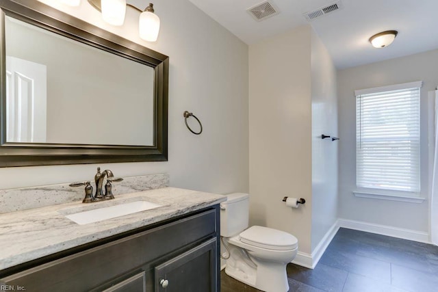 2825 Ridgeboard Pl, Chesapeake, VA 23323 - bathroom with baseboards, toilet, vanity, and tile patterned floors
