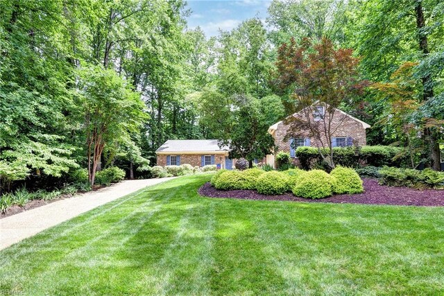 112 Holman Rd, Williamsburg, VA 23185 - view of front of house with a front yard