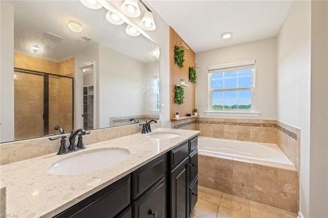 1925 Dale Greene Pl, Virginia Beach, VA 23456 - bathroom featuring a garden tub, double vanity, tile patterned floors, and a tile shower