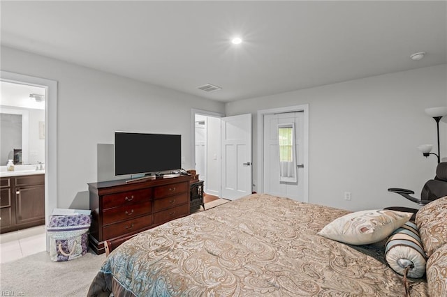 200 Quaint Ridge Rd, Williamsburg, VA 23188 - bedroom featuring connected bathroom and light colored carpet