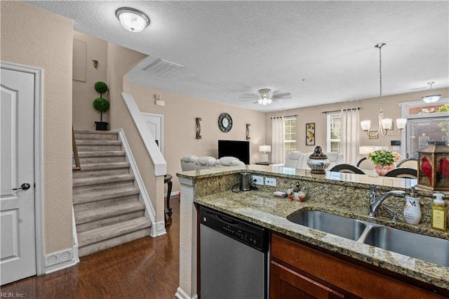 331 Fountain Way Unit 66, Hampton, VA 23666 - kitchen featuring stainless steel dishwasher, a sink, baseboards, light stone counters, and plenty of natural light