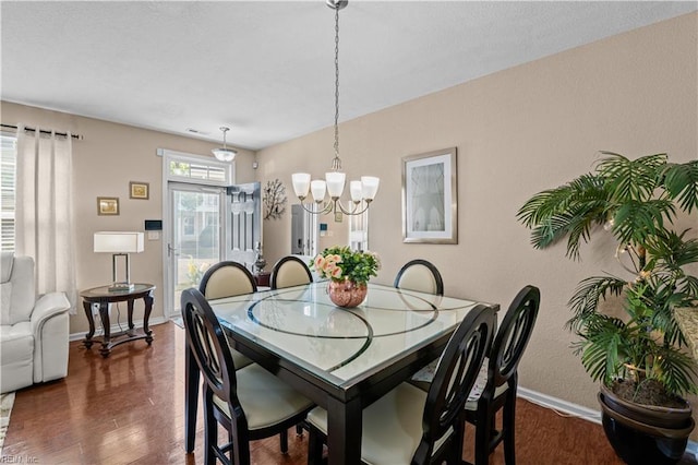 331 Fountain Way Unit 66, Hampton, VA 23666 - dining space featuring wood finished floors, a chandelier, and baseboards