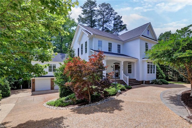 117 Shinnecock, Williamsburg, VA 23188 - traditional home featuring driveway, covered porch, and an attached garage