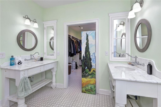 117 Shinnecock, Williamsburg, VA 23188 - full bathroom featuring baseboards, a spacious closet, and two vanities