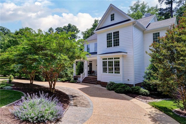 117 Shinnecock, Williamsburg, VA 23188 - traditional home with a shingled roof and a porch