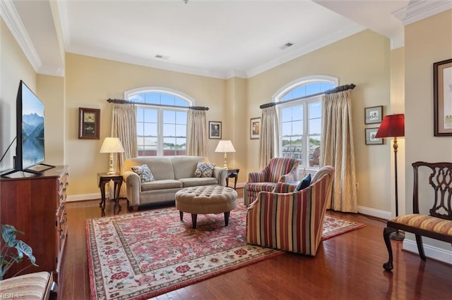 5414 Foundation St, Williamsburg, VA 23188 - living area with healthy amount of natural light, wood finished floors, baseboards, and ornamental molding