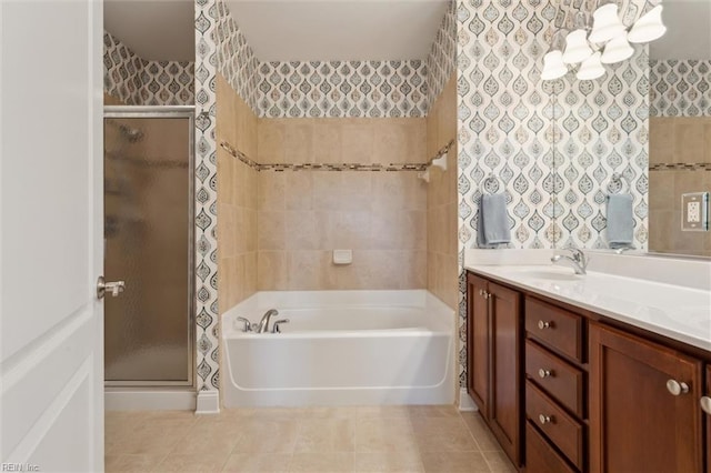 5414 Foundation St, Williamsburg, VA 23188 - bathroom featuring a shower stall, vanity, a garden tub, and tile patterned flooring