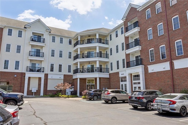5414 Foundation St, Williamsburg, VA 23188 - view of apartment building / complex featuring uncovered parking