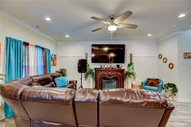 101 Utah St, Portsmouth, VA 23701 - living room featuring crown molding, ceiling fan, wood finished floors, a fireplace, and recessed lighting