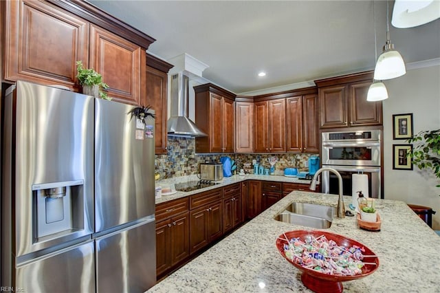 101 Utah St, Portsmouth, VA 23701 - kitchen with appliances with stainless steel finishes, wall chimney exhaust hood, a sink, decorative light fixtures, and backsplash