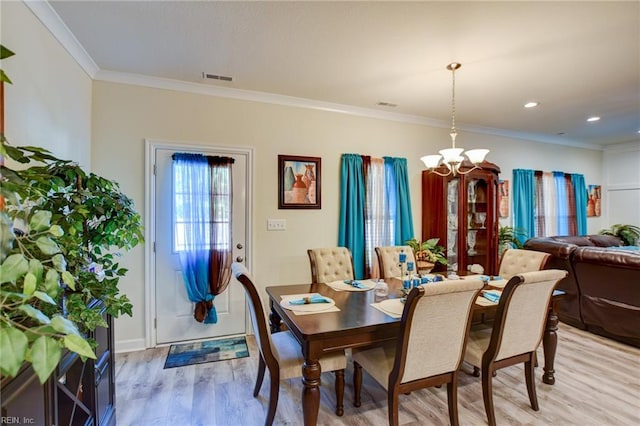 101 Utah St, Portsmouth, VA 23701 - dining area with a chandelier, light wood-style floors, ornamental molding, baseboards, and recessed lighting